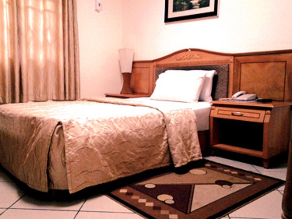Sunset Hotel Kumasi Chambre photo
